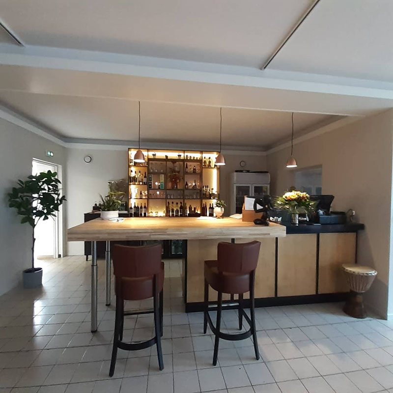 Photo de la caisse du restaurant aménagé et redécoré par HSP-Concept